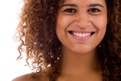Happy patient after gum grafting treatment in Irvine, CA